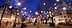City square with illuminated trees and light decorations during nighttime. - Olive Oil Times