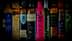 A collection of olive oil bottles featuring different brands and designs on a dark background. - Olive Oil Times