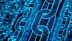 Close-up of digital chain links composed of binary code in a blue color scheme. - Olive Oil Times