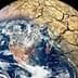 Image of Earth showing cracked land surface and visible water bodies from space. - Olive Oil Times