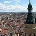 Aerial view of Zaragoza city featuring a prominent tower with a green dome. - Olive Oil Times