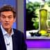Dr. Oz speaking with olive oil bottles displayed in the background during a television segment. - Olive Oil Times