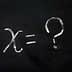 Chalkboard with the equation 'x = ?' written in white chalk. - Olive Oil Times