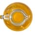 A glass cruet filled with yellow olive oil viewed from above. - Olive Oil Times