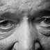 Close-up image of an elderly man's eyes with visible wrinkles and detailed features. - Olive Oil Times