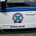 Side view of a Greek police vehicle showing the police logo and text. - Olive Oil Times