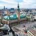 Aerial view of Hamburg City Hall with surrounding buildings and streets in the city. - Olive Oil Times