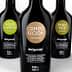 Five bottles of Melgarejo premium olive oil with different labels and designs. - Olive Oil Times