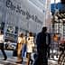 The exterior of The New York Times building with its name displayed prominently on the facade. - Olive Oil Times