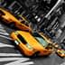 Yellow taxi cabs driving through a busy intersection in a city setting. - Olive Oil Times