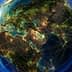 Digital representation of the Earth with illuminated connections across continents and oceans. - Olive Oil Times