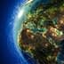 Illustration of Earth with glowing network connections over Europe and Africa. - Olive Oil Times