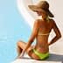 Woman wearing a green bikini and a straw hat sitting by the edge of a swimming pool. - Olive Oil Times