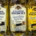 Five bottles of Filippo Berio olive oil in various types, including mild and light options. - Olive Oil Times