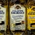Three bottles of Filippo Berio olive oil labeled 'Mild & Light' and 'Olive Oil' on a shelf. - Olive Oil Times