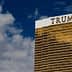 Trump International Hotel and Tower, a tall golden building with the name 'TRUMP' prominently displayed on top. - Olive Oil Times