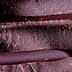 Close-up view of stacked layers of dark chocolate with a textured surface. - Olive Oil Times