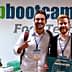 Three individuals posing together at a Startup Bootcamp Food Tech event with a sign in the background. - Olive Oil Times