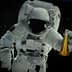 An astronaut in a space suit holding a flask filled with a yellow liquid while floating in space. - Olive Oil Times