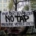 A protest banner reading 'From Berlin to Salento No Tap Preserve Mother Earth' displayed in an urban setting. - Olive Oil Times