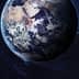 A detailed view of Earth from space, showing landmasses and oceans against a dark background. - Olive Oil Times