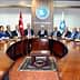 Group of individuals seated around a large conference table during a meeting at Marmarabirlik. - Olive Oil Times
