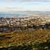 Aerial view of Cape Town with the coastline and mountains in the background. - Olive Oil Times
