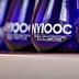 Blue glass awards with 'NYIOOC The New York International Olive Oil Competition' text displayed in a row. - Olive Oil Times