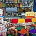 A variety of colorful spices, snacks, and packaged goods arranged in a market setting. - Olive Oil Times