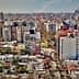 Aerial view of a densely populated urban area in Buenos Aires with various buildings and structures. - Olive Oil Times