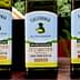 Three bottles of California Olive Ranch extra virgin olive oil with different labels: Mild & Buttery, Everyday, Rich & Robust. - Olive Oil Times