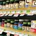 Various bottles of dietary supplements displayed on a store shelf with price tags. - Olive Oil Times