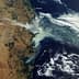 Satellite view showing smoke from bushfires over Eastern Australia, including Brisbane and Sydney. - Olive Oil Times