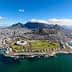 Aerial view of Cape Town featuring Table Mountain and the surrounding coastline. - Olive Oil Times