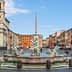 Fountain with sculptures and an obelisk in the center of Piazza Navona in Rome. - Olive Oil Times