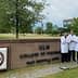 Group of five individuals in white lab coats standing in front of ULM College of Pharmacy sign. - Olive Oil Times