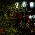 Street lamps adorned with decorative lights and ornaments during the holiday season. - Olive Oil Times
