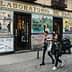 Storefront of Laboratorio de Especialidades Juanse with decorative tiles and signage in a city setting. - Olive Oil Times