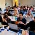 Participants seated at tables with laptops during a workshop session, focused on their tasks. - Olive Oil Times