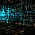 Abstract representation of digital data with numbers and symbols on a dark background. - Olive Oil Times