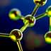 Close-up view of a molecular structure featuring green and yellow atoms connected by bonds. - Olive Oil Times
