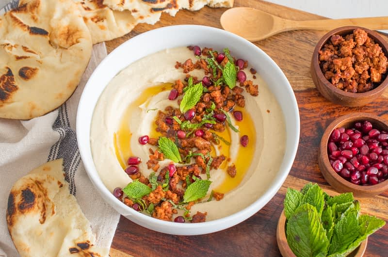 Olive Oil Hummus with Lamb Sausage, Mint & Pomegranate