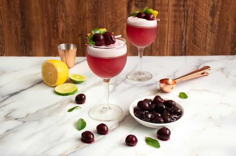 Rum Flip with Olive Oil Pickled Cherries