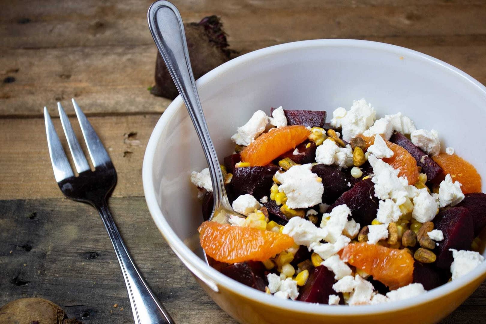 Roasted Beet Salad with Sweet Corn, Goat Cheese, and Pistachios