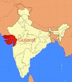 Map of India highlighting the state of Gujarat in red with surrounding regions in light color. - Olive Oil Times