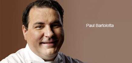 Portrait of chef Paul Bartolotta smiling against a neutral background. - Olive Oil Times