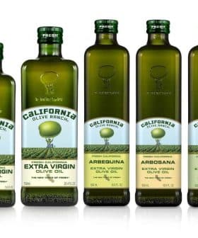 Five bottles of California Olive Ranch extra virgin olive oil in various varieties. - Olive Oil Times