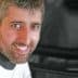 Portrait of Yiannis Tsivourakis smiling while wearing a chef's uniform. - Olive Oil Times