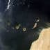 Aerial view of the Canary Islands showing multiple land masses surrounded by water. - Olive Oil Times