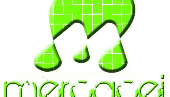 Logo of Mercacei Magazine featuring a stylized green letter M and the magazine name in lowercase. - Olive Oil Times